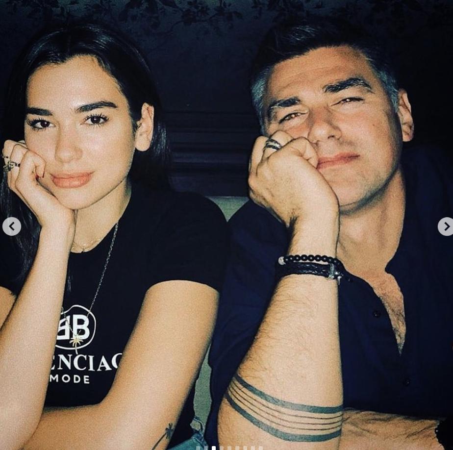 Dua Lipa sits beside her dad