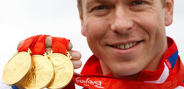 Chris Hoy with his 3 gold medals round his neck