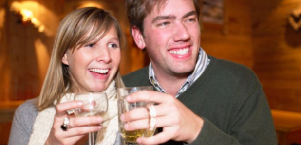 Couple drinking in a pub