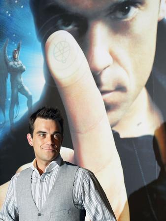 A proud-looking Robbie goes double