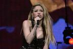 Image 1: Shakira on stage at the Jingle Bell Ball