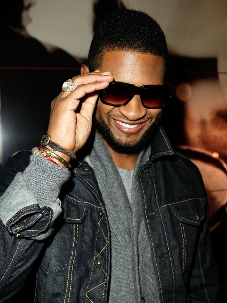 Usher with sunglasses on