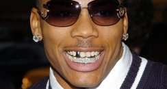 celebrities with bling teeth