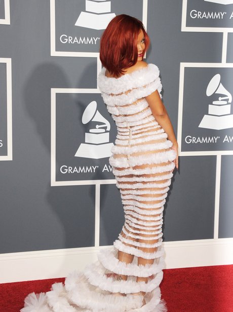 Rihanna in white striped gown at the Grammy  Arrivals 2011