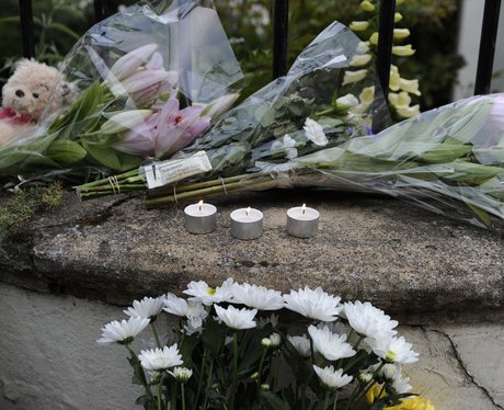 Flowers and messages for Amy Winehouse outside her London home