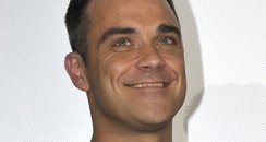 Robbie Williams attends Cars 2 Premiere