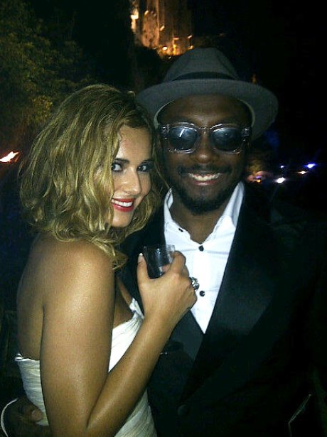 Will.I.Am and Cheryl Cole together.