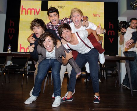 One Direction sign copies of 'Dare To Dream' book in London