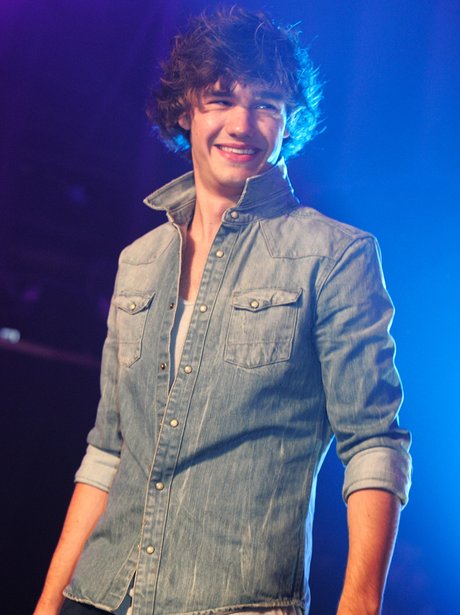 Liam Payne with curly hair.