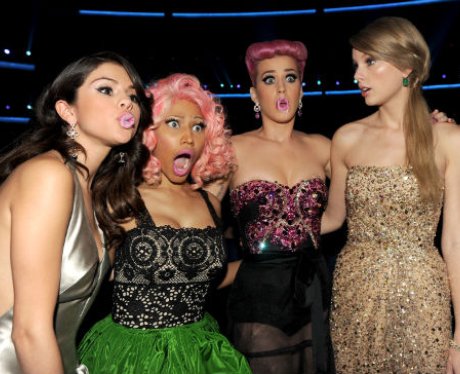 Nicki Minaj, Katy Perry, Selena Gomez and Taylor Swift pouting with pink lipstick
