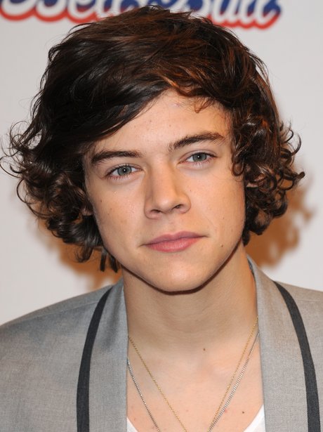 Harry Styles wearing suit jacket at Jingle Bell Ball