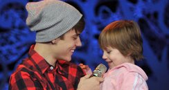 Justin performs 'baby' with his little sister