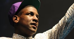 Labrinth performs on stage