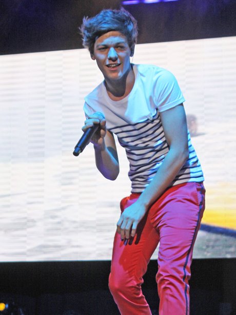 One Direction perform on their tour
