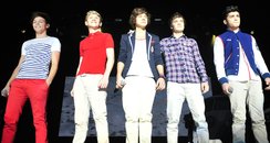 One Direction perform on their tour