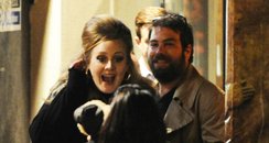 Adele with boyfriend outside restaurant