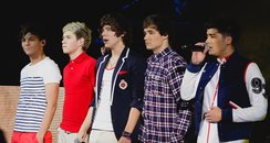 One Direction performing live in concert