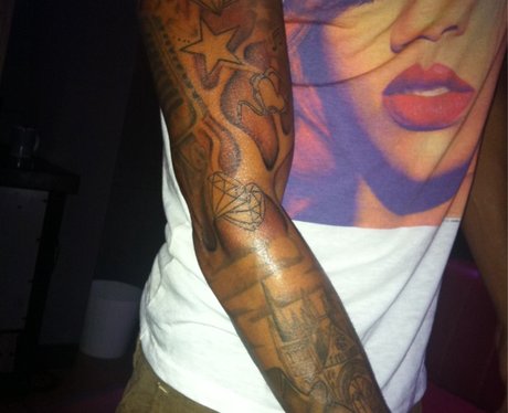 Aston shows of his new tattoo on twitter