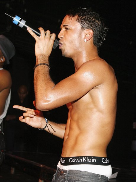 Aston Merrygold performs topless on stage.