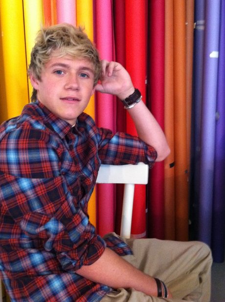 Niall Horan wearing a checked shirt.