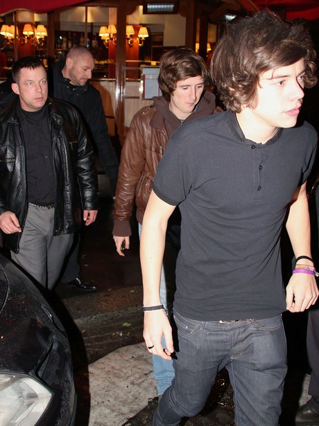 Harry Styles leaves a restaurant in Paris