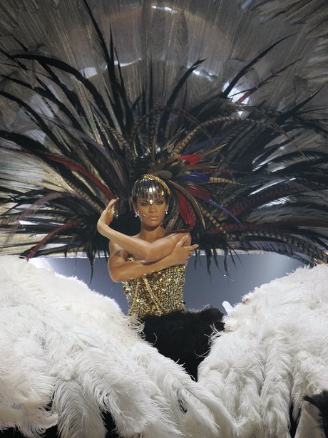 Rihanna performs on stage