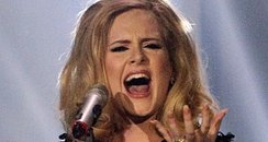 Adele perfomrs at the BRITS