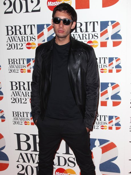 Example attends the BRIT Awards 2012