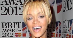 Rihanna attends the BRIT Awards 2012