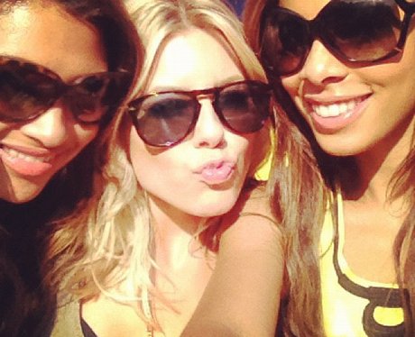 Mollie king wearing sunglasses