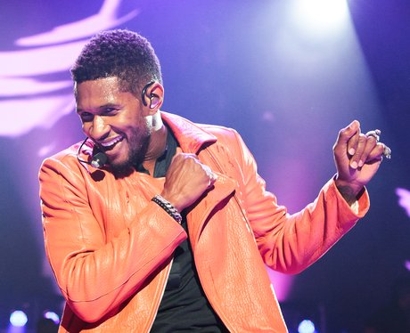 Usher performing live on stage