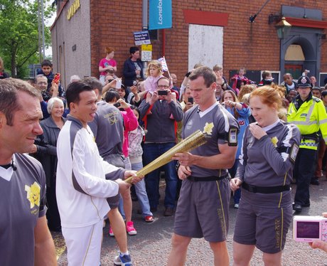 Torchbearer enjoying the crowds reaction