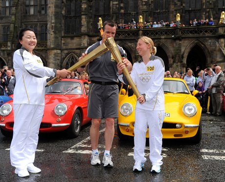 Smiles all round as torch arrives in Rochdale