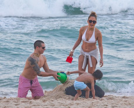 J-Lo and kids on beach