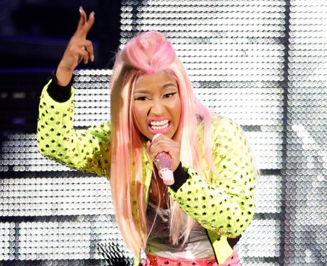 Nicki teamed her pink hot pants with a leather lime-coloured jacket ...