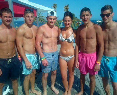 Tulisa poses in her bikini with fans on holiday