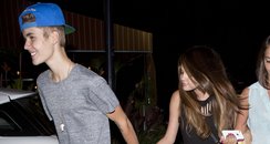 Justin Bieber and Selena Gomez holding hands