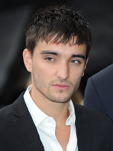 Tom Parker at the premiere of The Dark Knight Rises