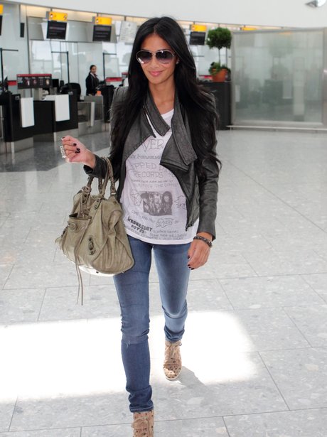 Nicole Scherzinger arrives back in the UK