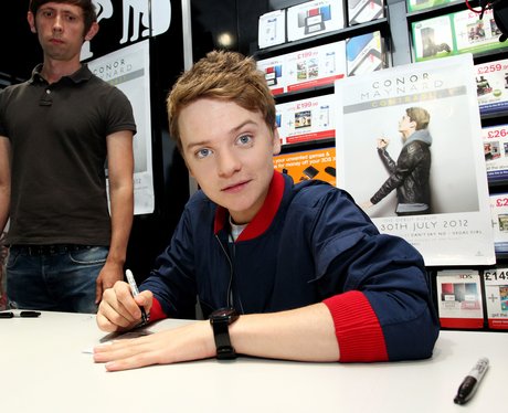 Conor Maynard signs copies of his new album for fa