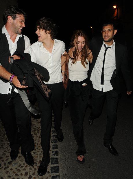 Harry Styles and Una Healy leaving Rochelle Wiseman's wedding.