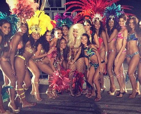 Nicki Minaj poses with her backing dancers