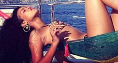 Rihanna in a hammock on holiday.