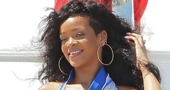 Rihanna wears a maxi dress on holiday. 