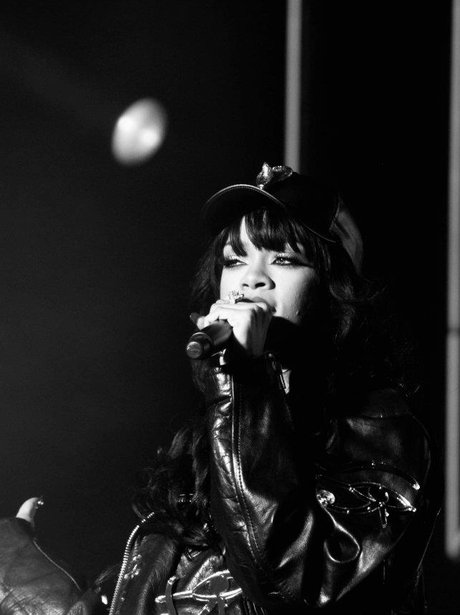 Rihanna performs live on stage
