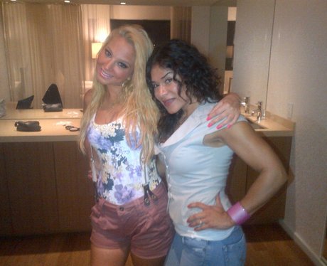 Tulisa poses with a friend