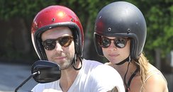Adam Levine and Bhati Prinsloo on a motercyle