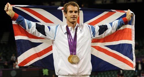 Andy Murray wears his Olympic medals
