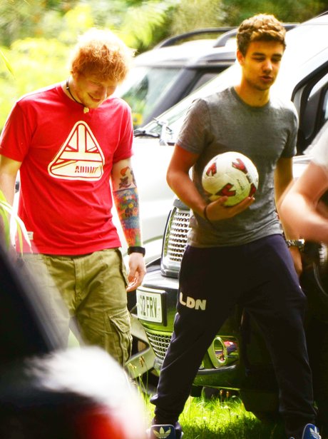Ed Sheeran and Liam Payne play football together.