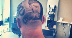 Example fan has album shaved in his head